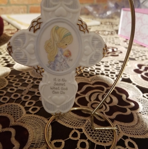PRECIOUS MOMENTS PORCELAIN CROSS ." IT IS NO SECRE